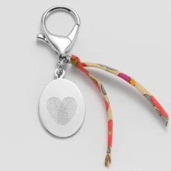 Hot HappyBulle Bijou de sac personnalisé médaille gravée acier ovale 33x25 mm et noeud Liberty