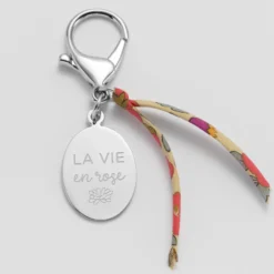 Hot HappyBulle Bijou de sac personnalisé médaille gravée acier ovale 33x25 mm et noeud Liberty