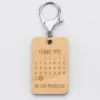 Outlet HappyBulle Porte-clés personnalisé calendrier médaille gravée bois