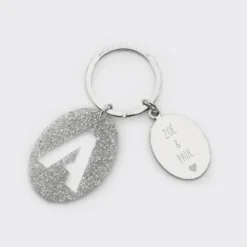 HappyBulle Porte-clés personnalisé médaille gravée ovale acier et breloque initiale acrylique é Pailleté argent